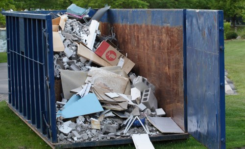 House clearance team removing furniture from a home in Chislehurst