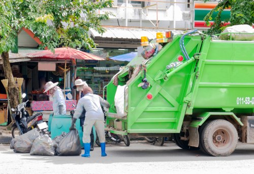Professional garage clearance team in action